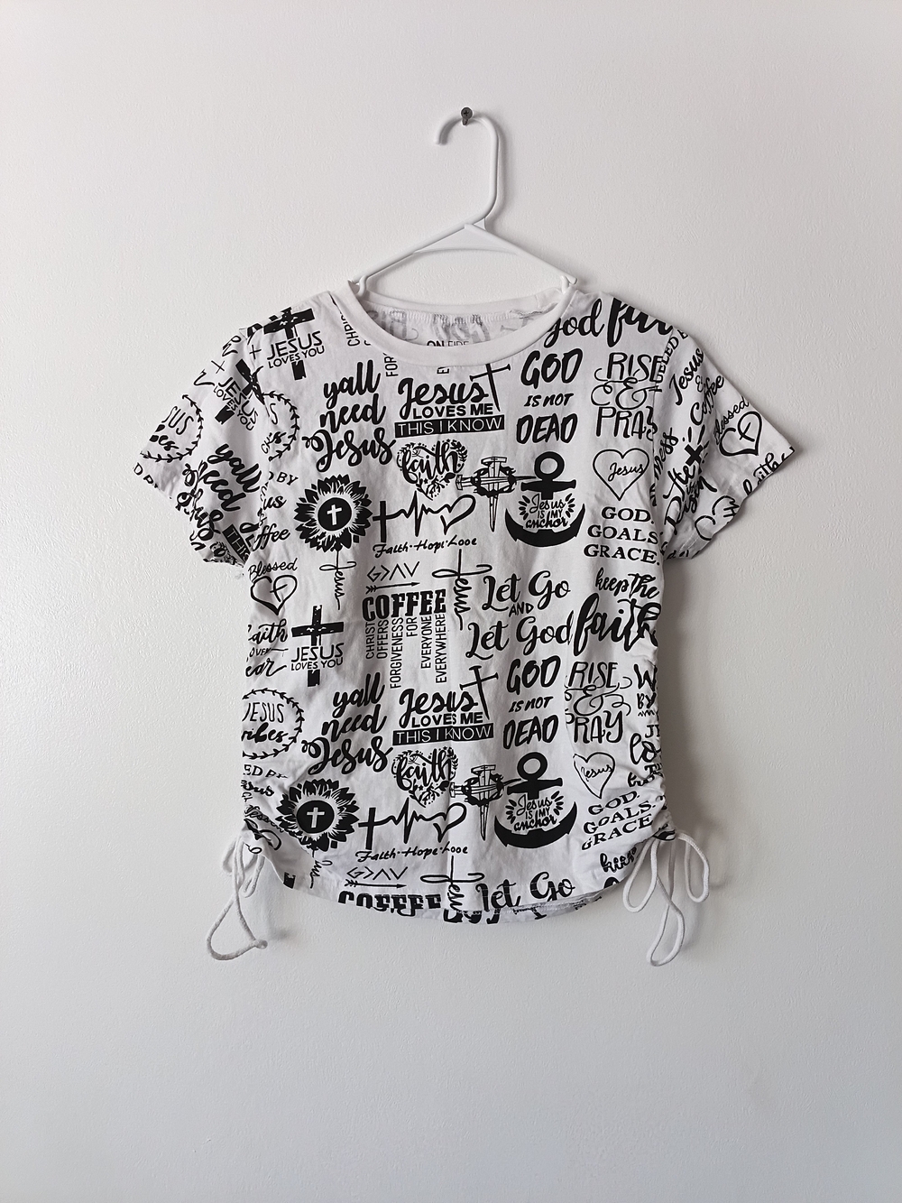 On Fire White Short Sleeve Graphic Faith Tee with Black Lettering and Side Ties